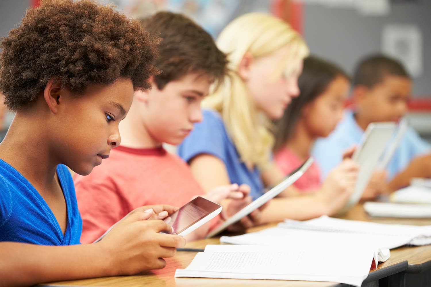 Students learning with digital tuition resources